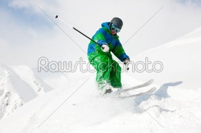 Man skiing downhill