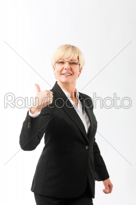 Mature woman with thumbs up