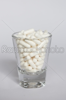 medicines in glass