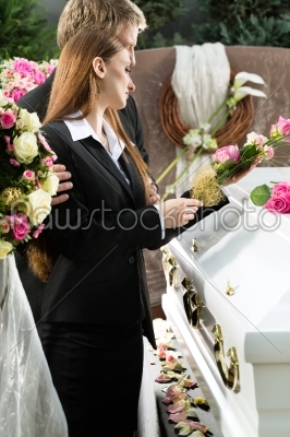 Mourning People at Funeral with coffin