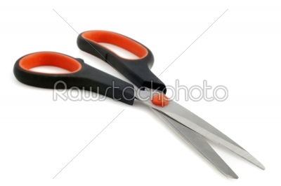 Pair of red handled scissors isolated on white 