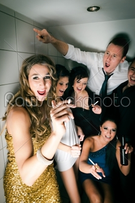 People in club and smoking in the toilet