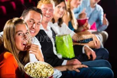 People see a movie in the cinema and have fun