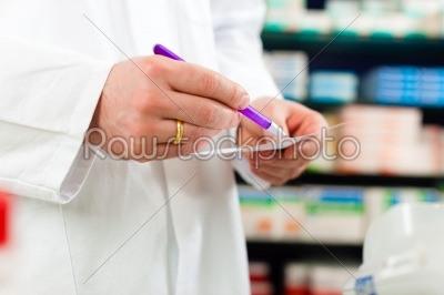 Pharmacist prescription slip in pharmacy