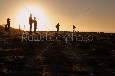 Photographers At Sunset