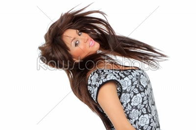 Portrait of a pretty young woman jumping in joy 