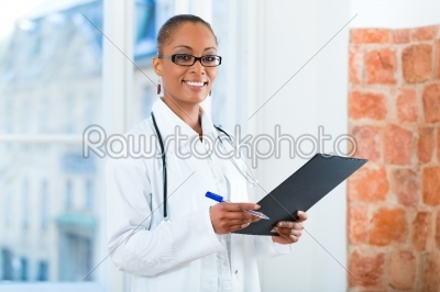 Portrait of young female doctor in clinic