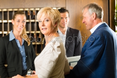 Reception - Guests check in a hotel