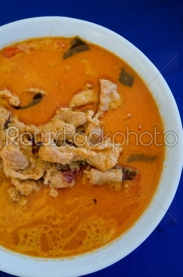 red curry on blue background