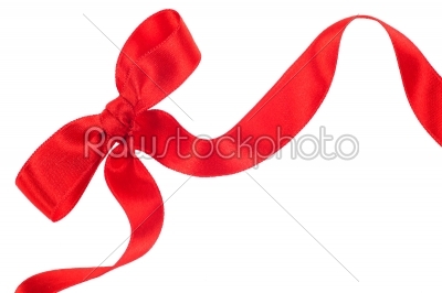 Red ribbon with bow on white  