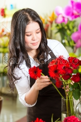 Saleswoman in a flower shop