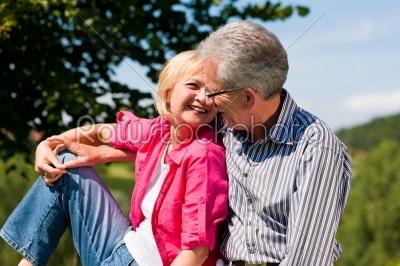 Senior couple flirting and having fun