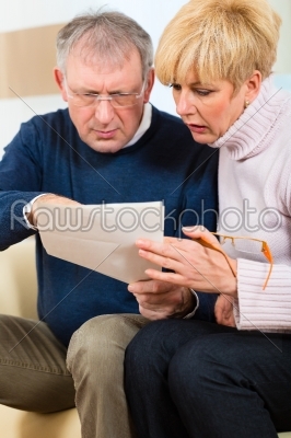 Seniors at home receiving a bad message