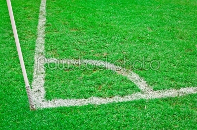 shot of a soccer field with a corner flag pole. 