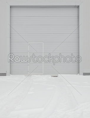 simple metal door in gray wall