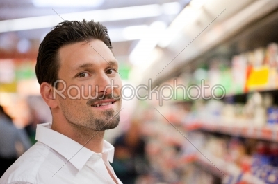 Smiling Young Customer at Supermarket