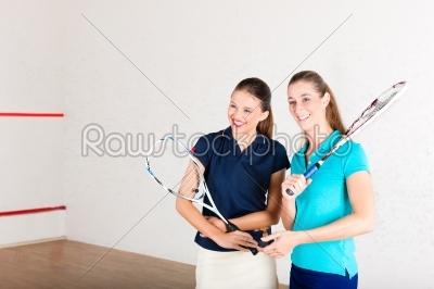 Squash racket sport in gym, women training