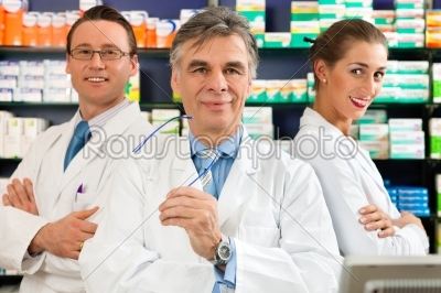 Team of pharmacists in pharmacy 
