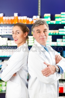 Team of pharmacists in pharmacy
