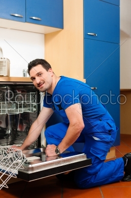 Technician repairing the dishwasher