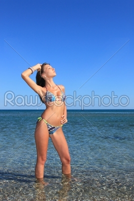 The beautiful bikini model posing 