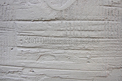 The white plastered relief wall