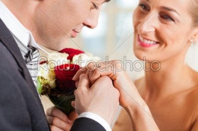 Wedding couple giving promise of marriage