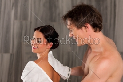 Wellness - couple getting a massage and cleansing