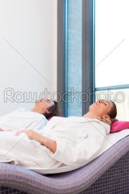 Wellness - man and woman relaxing after sauna