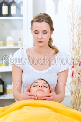 Wellness - woman getting head massage in Spa