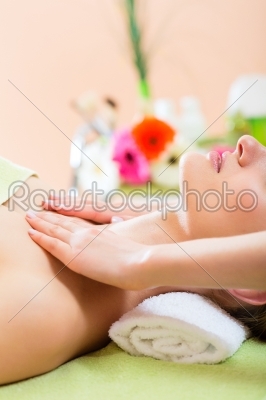 Wellness - woman getting shoulder massage in Spa