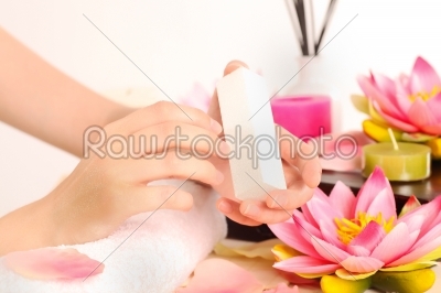 Woman doing manicure