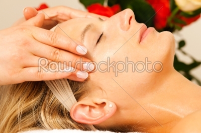Woman enjoying wellness head massage