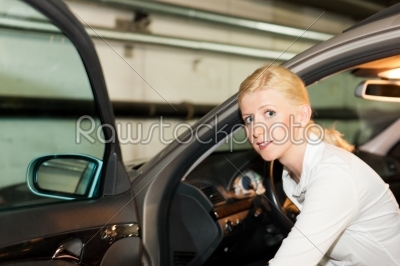 Woman getting into her car