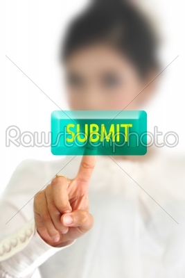 woman hand pressing submit button on a touch screen