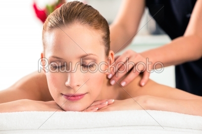 Woman having wellness massage in spa