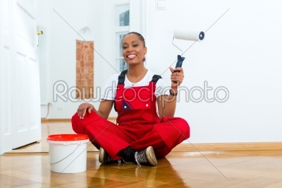 Woman in her home renovating diy