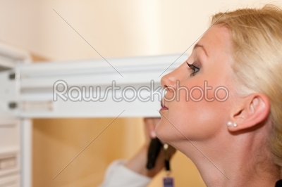 Woman looking after mail in letter box