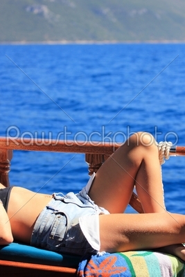 Woman relaxing on cruise ship