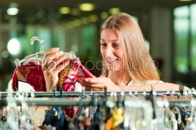 Woman shopping in a clothing store