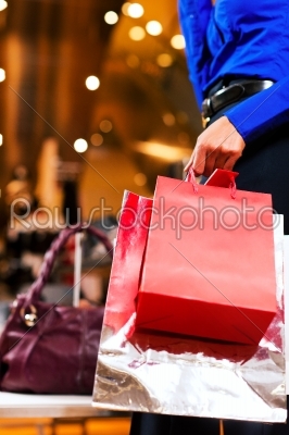 Woman shopping in Mall with bags