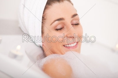 Woman takes bath 