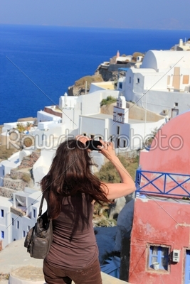 Woman visiting the island of Santorini