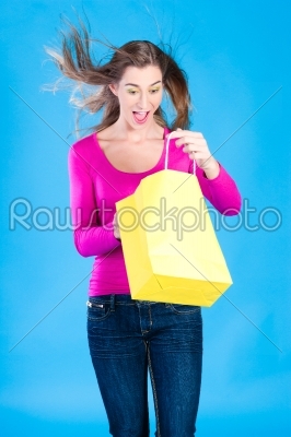 woman with colored shopping bags