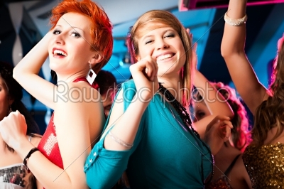 Women in club or disco dancing