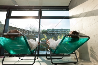 Young couple relaxing in wellness spa
