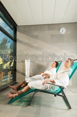 Young couple relaxing in wellness spa