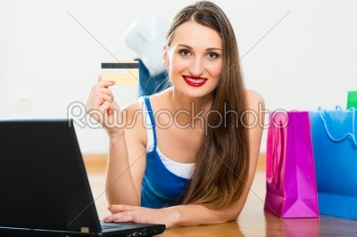 Young woman buying in the Internet