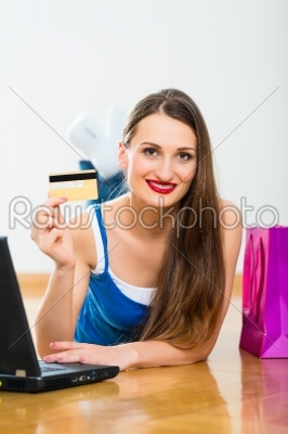 Young woman buying in the Internet
