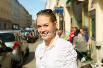 Young woman in the city at summer